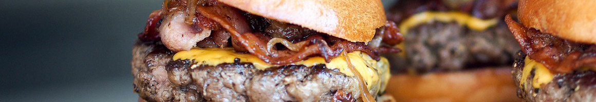 Eating Burger Sandwich Pub Food at Clark Powells Restaurant and Bar restaurant in Ebensburg, PA.